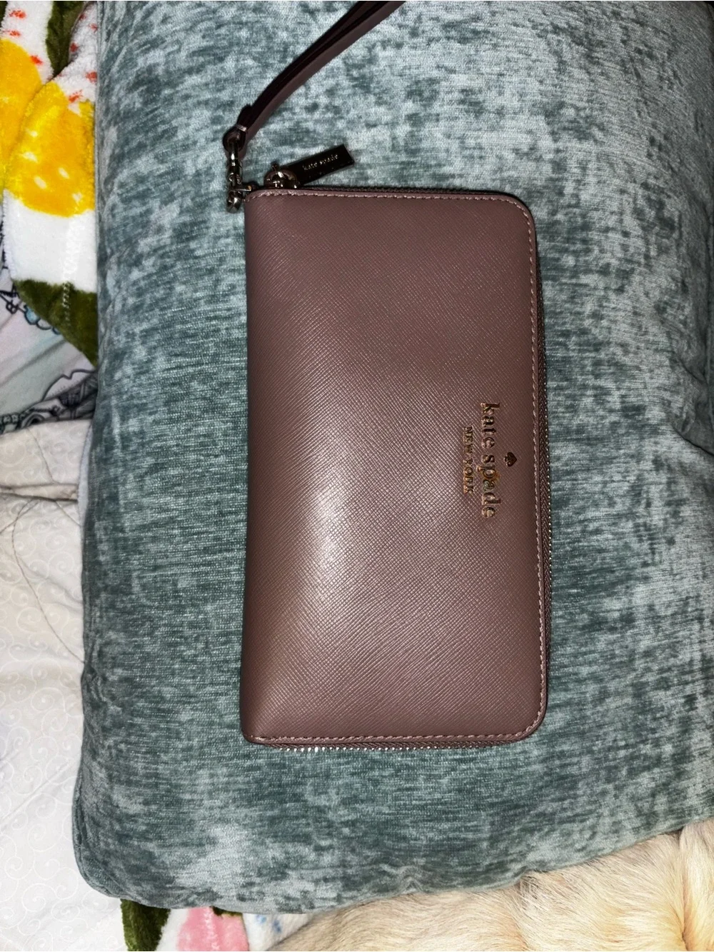 kate spade mauve zip-around wristlet with gold logo